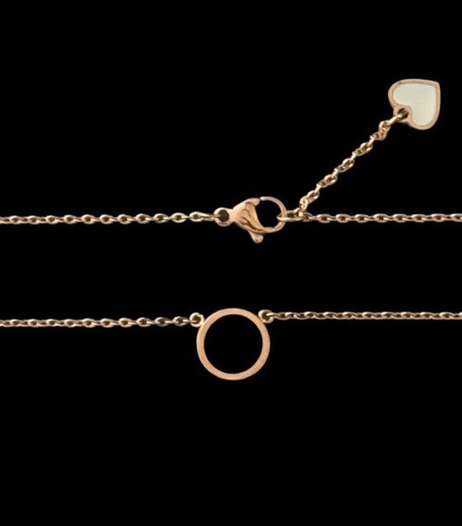 Pendentif doré (rose) émaillé bicolore noir / blanc